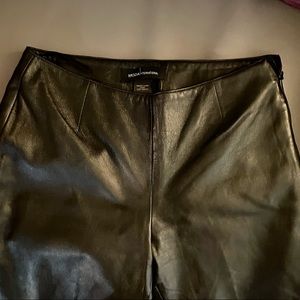 Genuine Leather Lining. 100% polyester